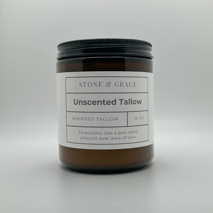 Jar labeled 'Unscented Tallow' by Stone & Grace on a gray background